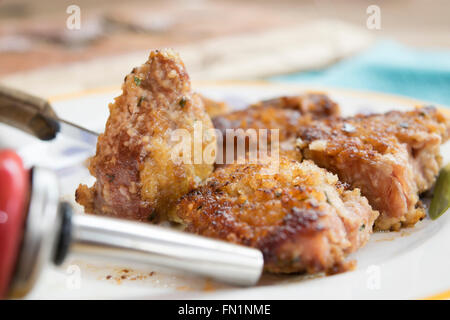 morsels of tuna breaded and fried in pan Stock Photo