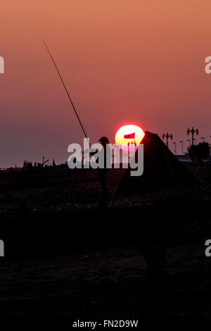 Sunset on 13/03/2016 at Seafront, Worthing. Pictured: 3 friends take a ...