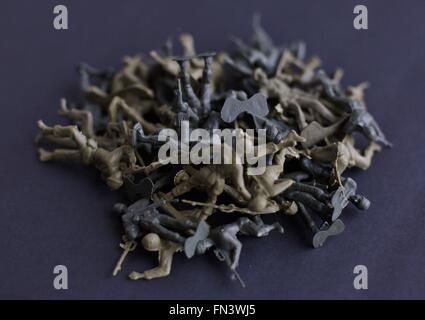 A pile of plastic soldier toys made in China. Stock Photo