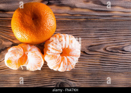 tangerines on the wooden background. Stock Photo
