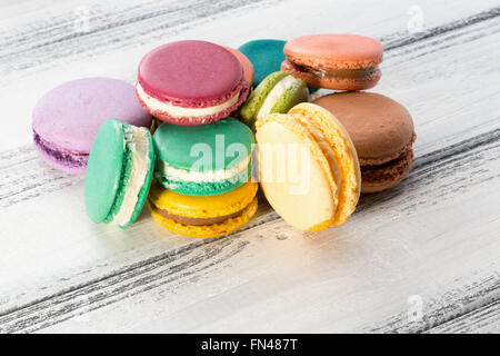 macaroons on the white wooden background. Stock Photo