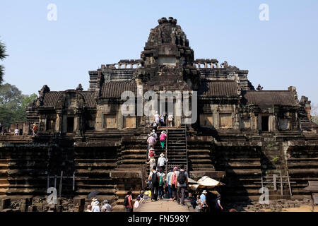 Tourists entering Baphuon temple at Angkor, Cambodia. It is located in Angkor Thom, near Siem Reap, Cambodia
