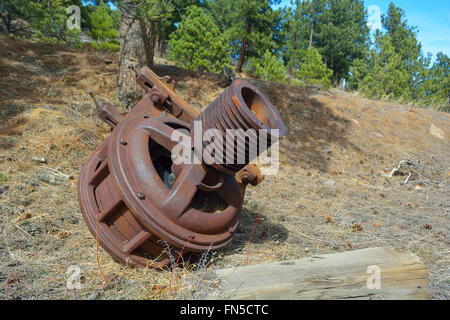 Rusting Abandoned Antique Motor and Worm Gear Outside Stock Photo