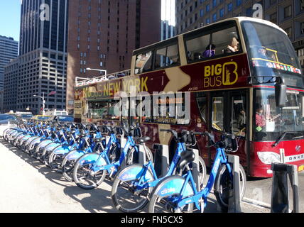 Citibikes and Big Bus in New York City Stock Photo