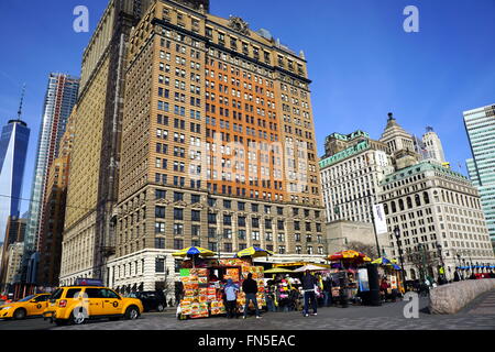 New York City Street Food Vendors and Skyscrapers, Battery Park, NYC, NY, USA Stock Photo