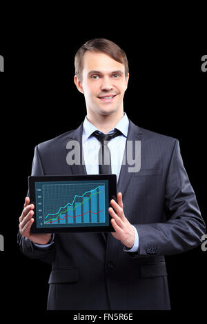 Businessman Showing Graph On Digital Tablet Stock Photo