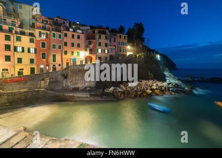 Riomaggiore at night. It is one of colorful villages of Cinque Terre in Italy, suspended between sea and land Stock Photo