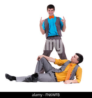 Disco dancers showing some movements against isolated white Stock Photo