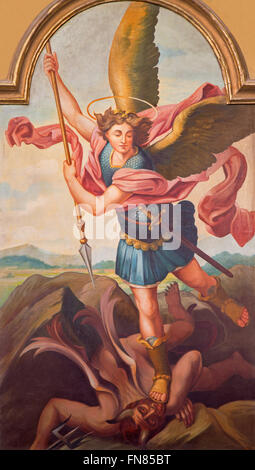 SEBECHLEBY, SLOVAKIA - FEBRUARY 27, 2016: The painting of archangel Michael from main altar of parisch church of St. Michael. Stock Photo