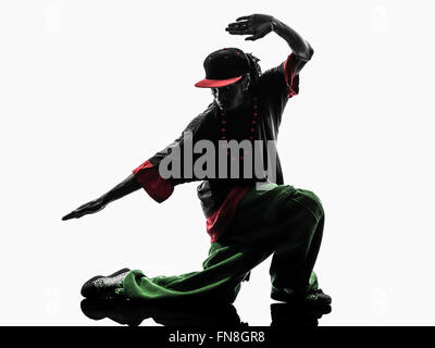 one hip hop acrobatic break dancer breakdancing young man silhouette white background Stock Photo