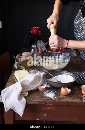 Woman baking in kitchen Stock Photo