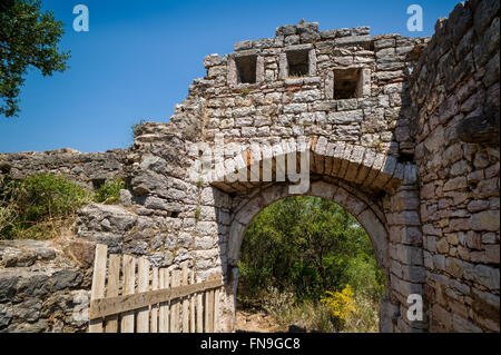 Main gate to old ruined fortress in Sutomore, Montenegro Stock Photo