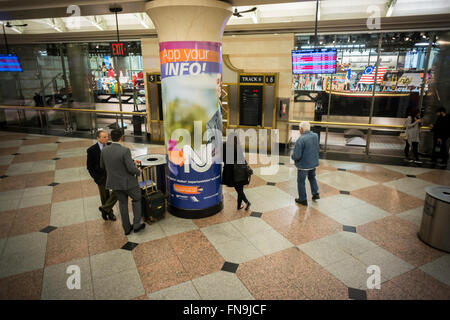Travelers at the NJ Transit station in Penn Station in New York on Tuesday, March 8, 2016. New Jersey Transit rail workers planning on striking on Sunday, March 13 at 12:01AM if a deal with NJT is not hammered out. On Monday 160,000 riders  who use the rail system on a weekday will have to contend with contingency plans that can only accommodate 40 percent of them.  (© Richard B. Levine) Stock Photo