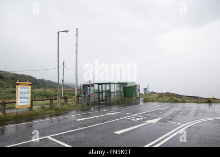 The tiny car ferry from Lochranza on the Isle of Arran travels to Claonaig on Kintyre, Scotland where it is greeted with minimal Stock Photo