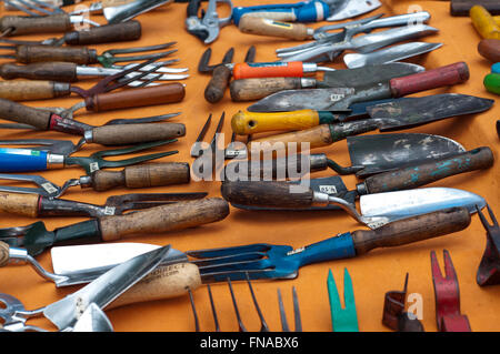 Garden tools selection fork spade forks spades small hand size wooden handle at carboot sale in Bath, UK. Stock Photo