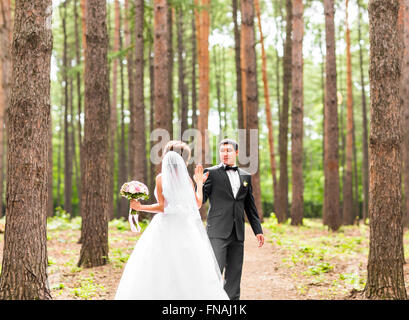 Bride and groom dancing  in nature. Wedding dance outdoors Stock Photo