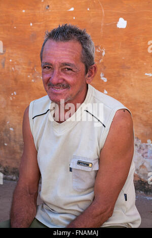 Daily life in Cuba - portrait of Cuban man smiling at Trinidad, Cuba Stock Photo