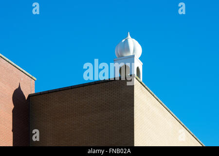 Minaret against blue sky on the Sikh Gurudwara Temple in Milton Keynes. UK Stock Photo