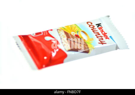 Kinder Country chocolate bar isolated on white background. Kinder Country bars are produced by Ferrero Stock Photo