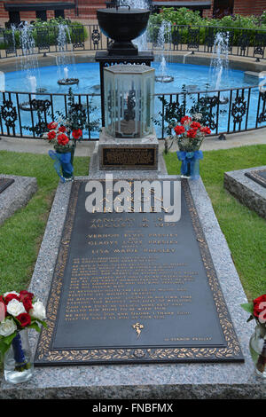 The grave site of Elvis Presley at Graceland, his home and now a museum in Memphis where fans make pilgrimages to see The King Stock Photo