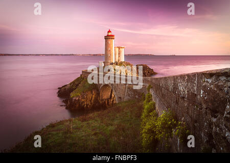 Lighthouse Phare du Petit Minou at sunset, Brittany, France Stock Photo