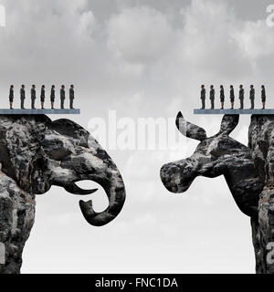 Republican democrat political division concept and American election fight as as two mountain cliff sculptures shaped as an elephant and donkey symbol fighting for the vote of the United states presidential and government seats. Stock Photo