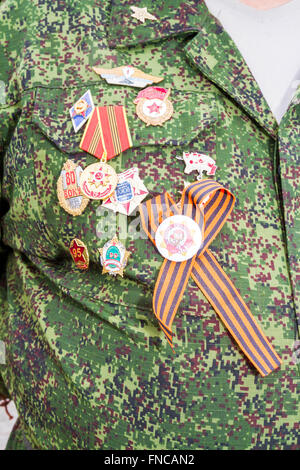 Medals on the chest of a veteran Stock Photo