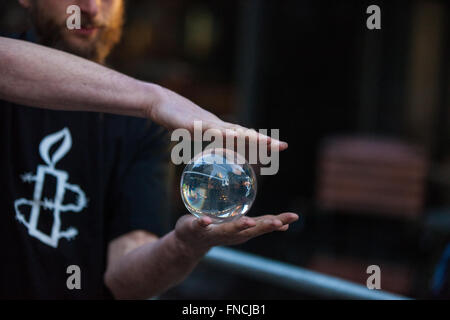 London, UK. 14th March, 2016. Amnesty International campaigners stage a circus outside the Israeli embassy to publicise the case of Mohammad Faisal Abu Sakha, a Palestinian circus performer detained without charge by the Israeli military since late 2015. Credit:  Mark Kerrison/Alamy Live News Stock Photo