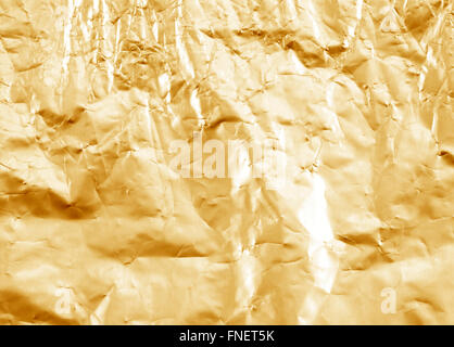 Shiny yellow leaf gold foil texture background Stock Photo