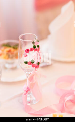 Close-up of wedding glasses decorated Stock Photo