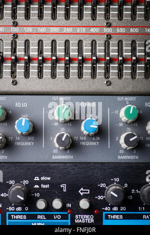 Color image of many buttons in a sound recording studio. Stock Photo