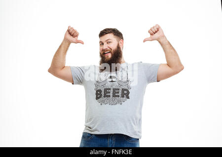 Successful happy bearded man pointing on himself over white background Stock Photo