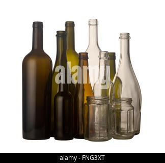 Horizontal front view of a group of glass bottles and jars in different colors isolated on white background Stock Photo