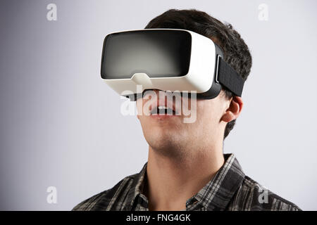 Young Man Wearing Virtual Reality Headset Stock Photo