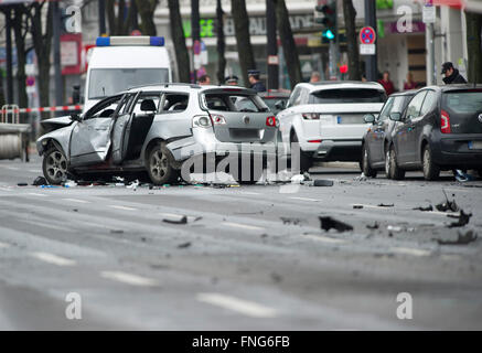 Berlin, Germany. 15th Mar, 2016. A damaged car on Bismarckstrasse in Berlin, Germany, 15 March 2016. The driver died when an explosion occurred in the vehicle while it was moving. PHOTO: PAUL ZINKEN/DPA/Alamy Live News Stock Photo