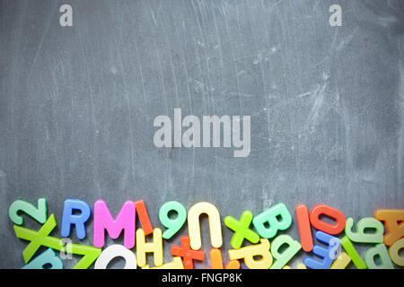 Blackboard background with colored letter blocks Stock Photo