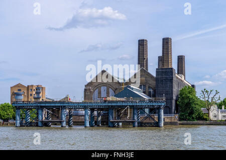 Greenwich Power station and old coal jetty pier on the river Thames, London Borough of Greenwich, South East London, UK Stock Photo