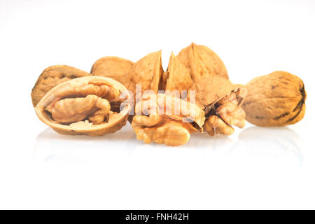 Walnuts in shells isolated on white background Stock Photo
