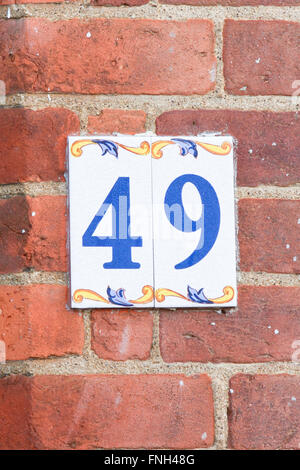 House number 49 sign painted tiles Stock Photo