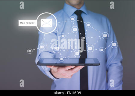 Business check e-mail and sending  on tablet. Stock Photo