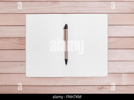 Notebooks on the background of wooden boards. Stock Photo