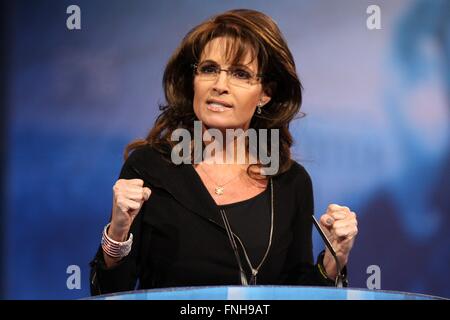 Former Alaskan Governor Sarah Palin addresses the annual American Conservative Union CPAC conference at National Harbor March 16, 2013 in Oxon Hill, Maryland. Stock Photo