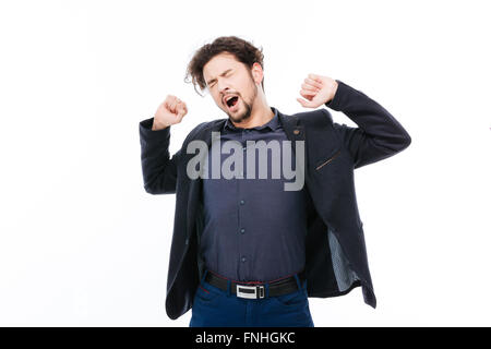Young businessman yawning isolated on a white background Stock Photo