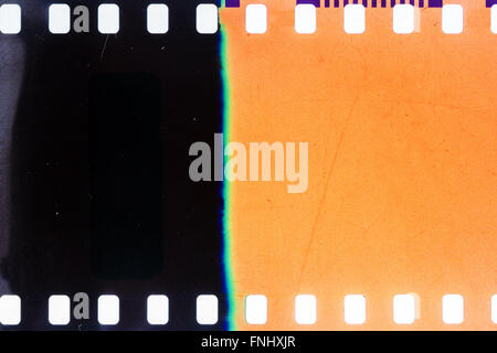 Blank yellow vibrant noisy film strip texture background Stock Photo