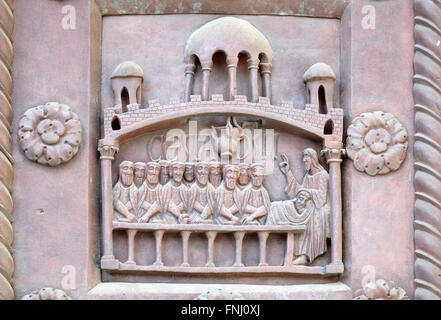 The Last Supper on the San Ranieri gate of the Cathedral St. Mary of the Assumption in Pisa, Italy Stock Photo