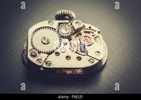 mechanism antique vintage wrist watch beautiful original black and metallic background Stock Photo