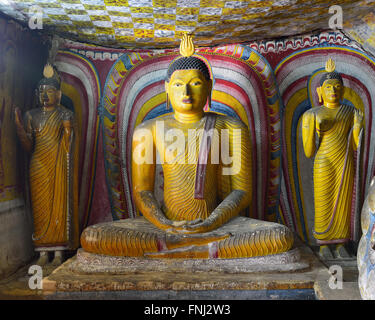Insides of caves in ancient Buddhist complex in Dambulla cave temple.Sri Lanka. The photograph is presenting the statue of Budda Stock Photo