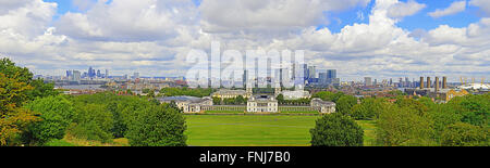 Panorama of downtown London, Canary Wharf, old Royal Naval College and the Millennium Dome from Observatory hill in Greenwich. Stock Photo