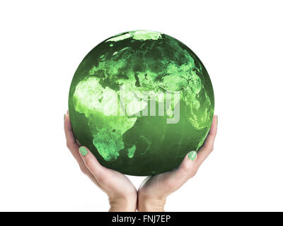 Green Planet Earth being supported by female hands. Stock Photo