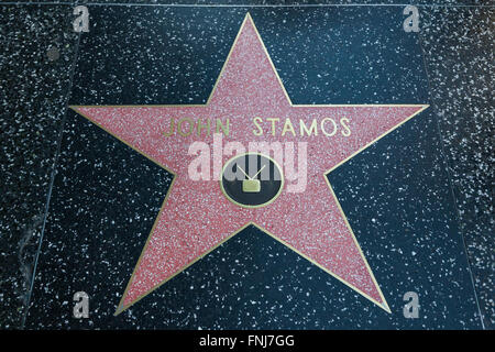 HOLLYWOOD, CALIFORNIA - February 8 2015: John Stamos' Hollywood Walk of Fame star on February 8, 2015 in Hollywood, CA. Stock Photo